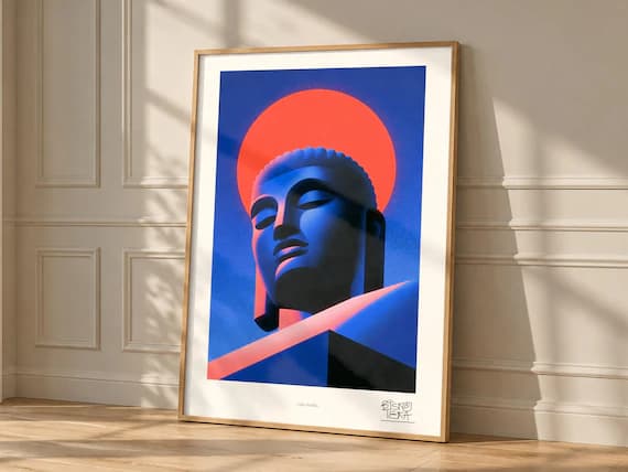 Calm Buddha framed art print, shown hanging in a styled room